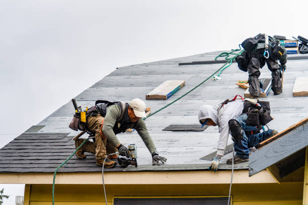 Professional Roofing technician working in Riverside, ID